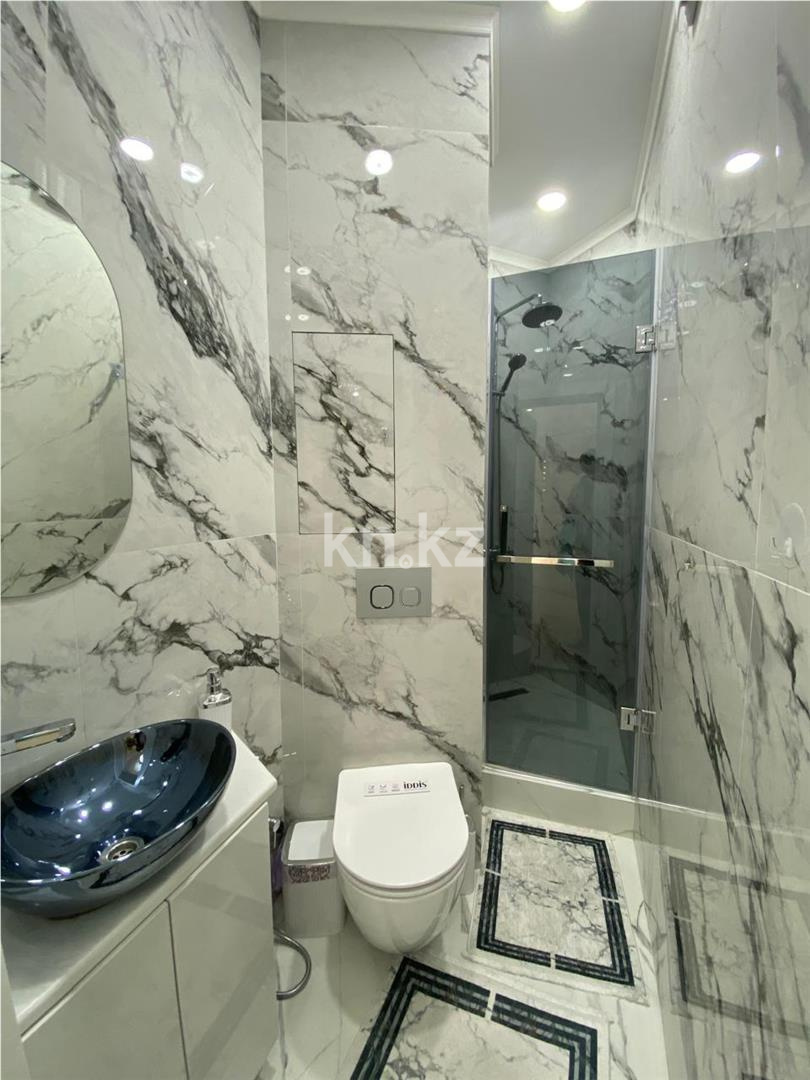 Продажа 3-комнатной квартиры, 107 м², ул. Муканова в Караганде - фото 14