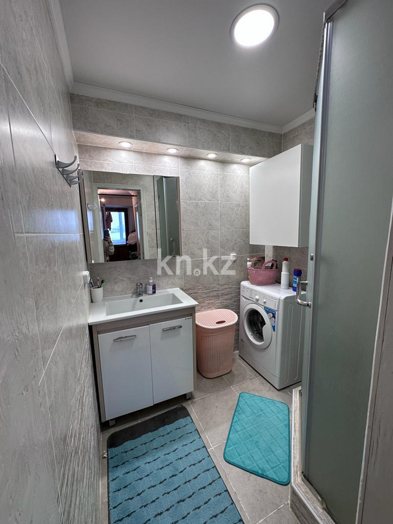 Продажа 3-комнатной квартиры, 102 м², ул. Муканова в Караганде - фото 11