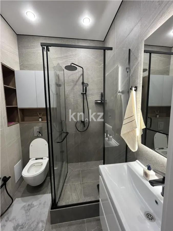 Продажа 2-комнатной квартиры, 59 м², ул. Омарова, дом  2/1 в Астане - фото 4