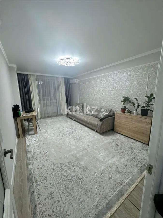 Продажа 2-комнатной квартиры, 69 м², ул. Толе би, дом  285/8 стр в Алматы - фото 2