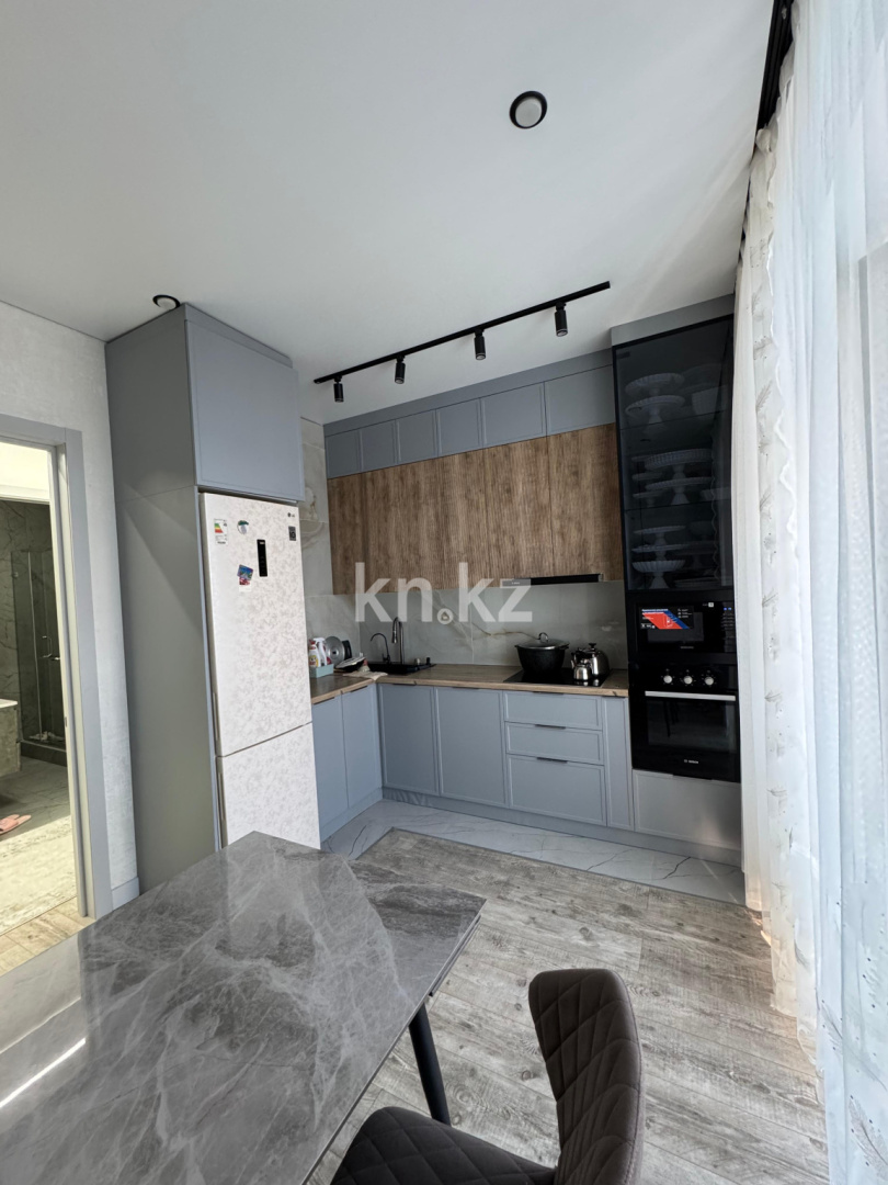 Продажа 4-комнатной квартиры, 105 м², ул. Таттимбета, дом  35 в Караганде - фото 4