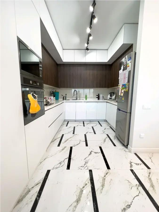 Продажа 4-комнатной квартиры, 140 м², ул. Кунаева, дом  12 в Астане - фото 4