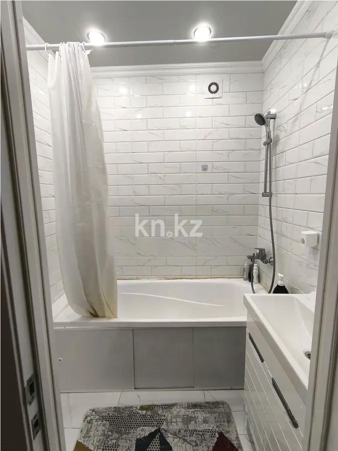 Продажа 2-комнатной квартиры, 56 м², пр. Кошкарбаева, дом  15 в Астане - фото 4