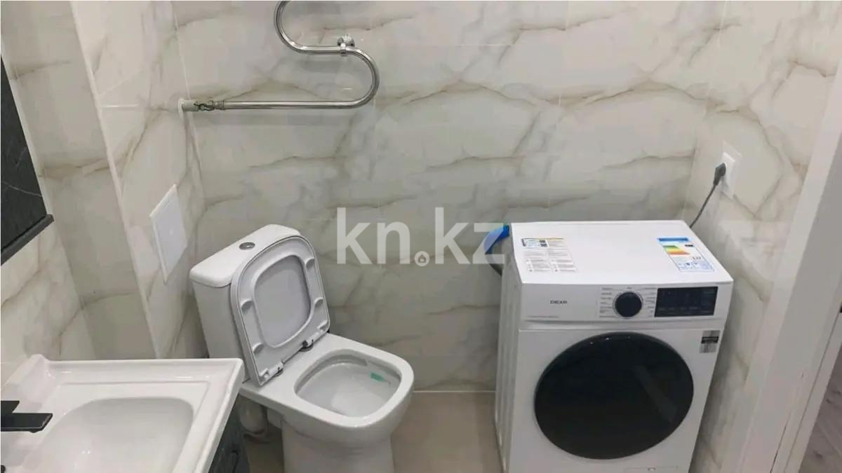 Продажа 1-комнатной квартиры, 37 м², ул. Омарова, дом  12в в Астане - фото 3