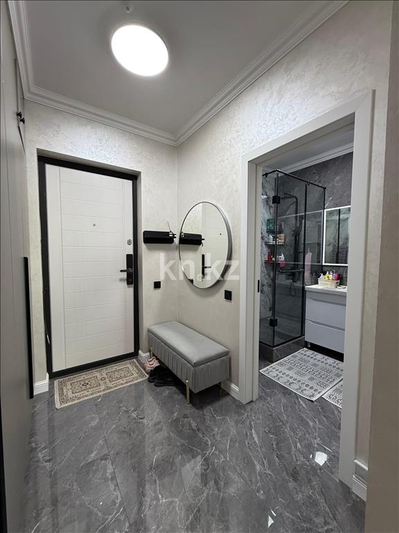 Продажа 2-комнатной квартиры, 52 м², ул. Толе би, дом  285/8 к13 - ул. Утеген батыра в Алматы - фото 14