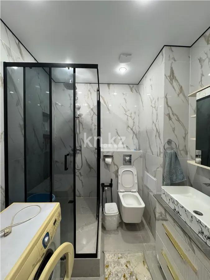 Продажа 2-комнатной квартиры, 56 м², ул. Жандосова, дом  94а в Алматы - фото 4