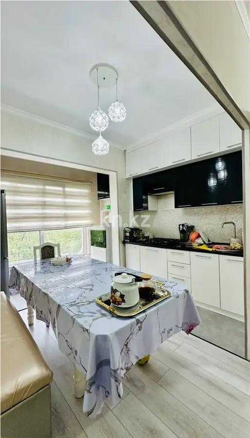 Продажа 2-комнатной квартиры, 57 м², мкр-н Аксай-3а, дом  74 в Алматы - фото 3