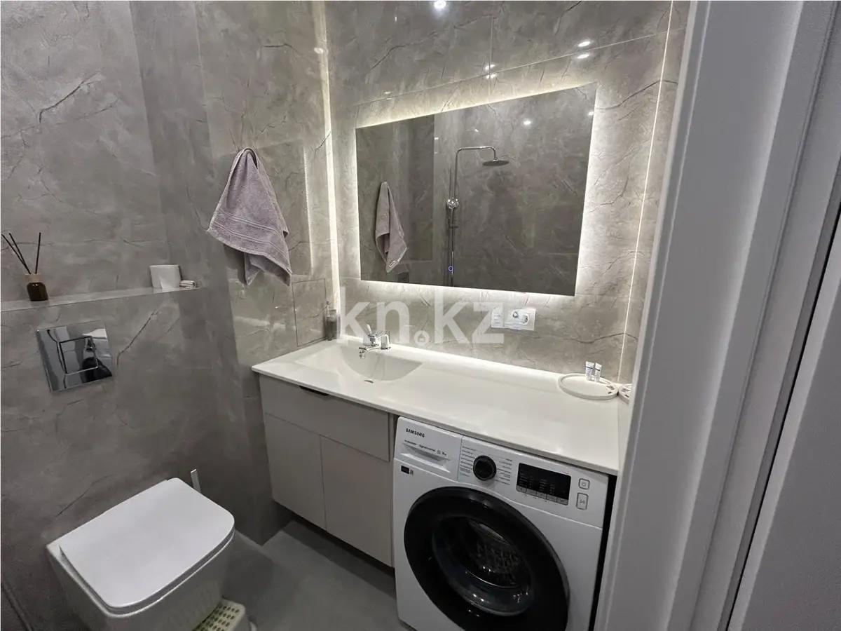 Продажа 2-комнатной квартиры, 60 м², ул. Омарова, дом  19 в Астане - фото 5