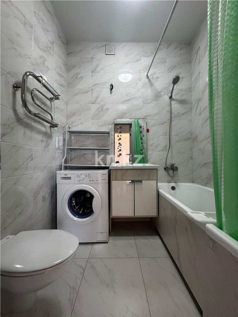 Продажа 2-комнатной квартиры, 48 м², ул. Омарова в Астане - фото 7