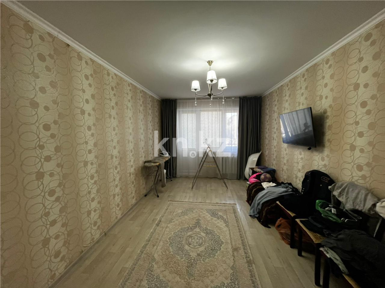 Продажа 3-комнатной квартиры, 63 м², 15-й мкр., дом  16 в Караганде - фото 4