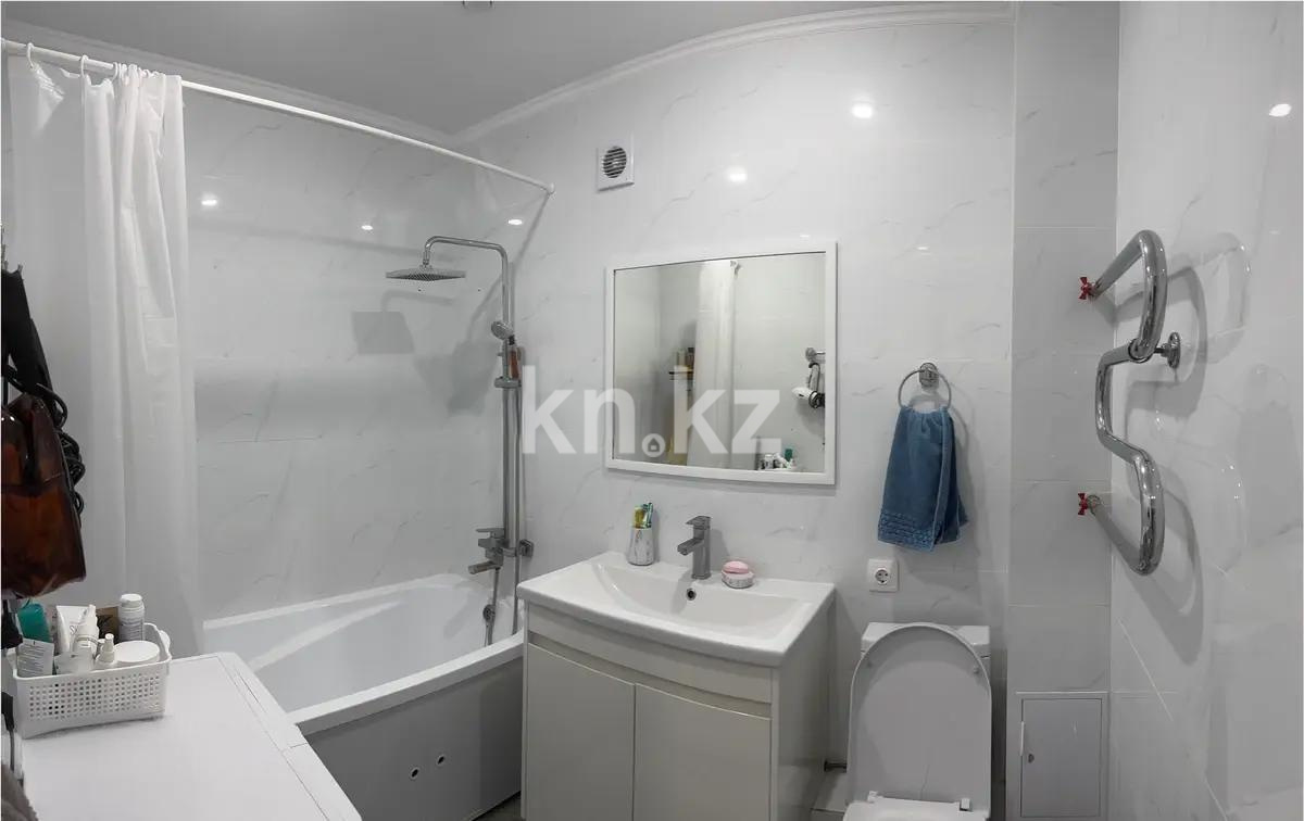 Продажа 2-комнатной квартиры, 57 м², ул. Куйши Дина, дом  46/1 в Астане - фото 4