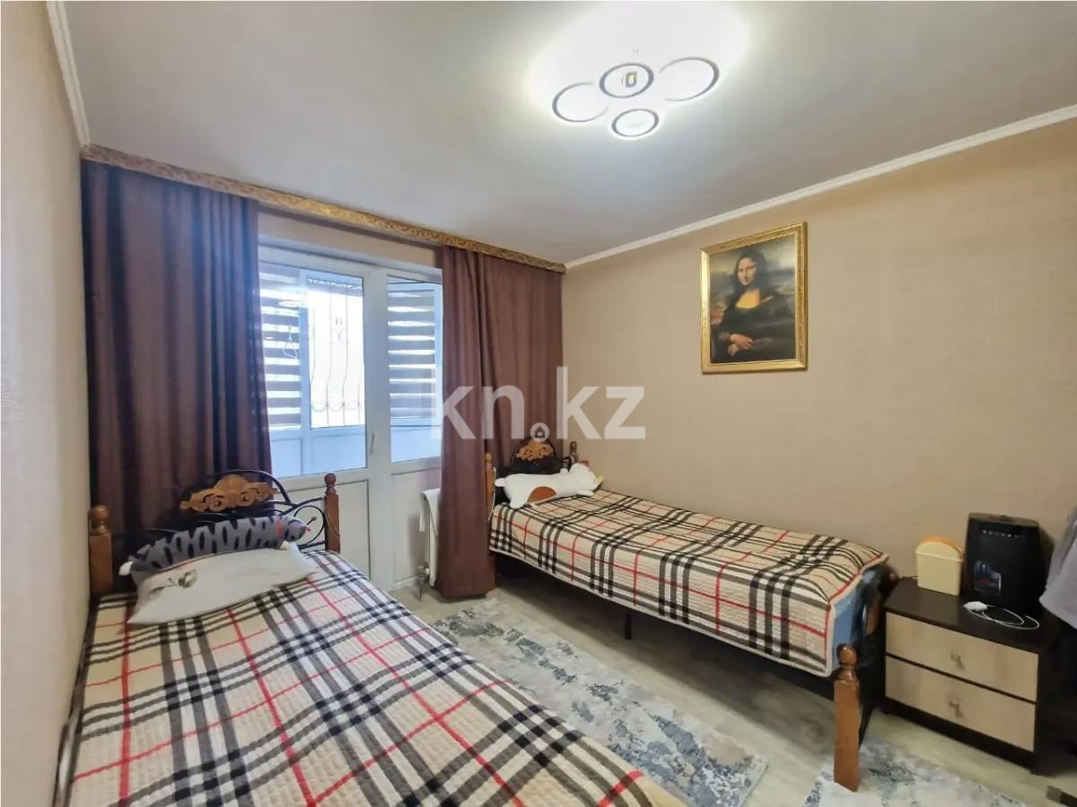 Продажа 2-комнатной квартиры, 56 м², мкр-н Нуркент, дом  5/4 в Алматы - фото 2