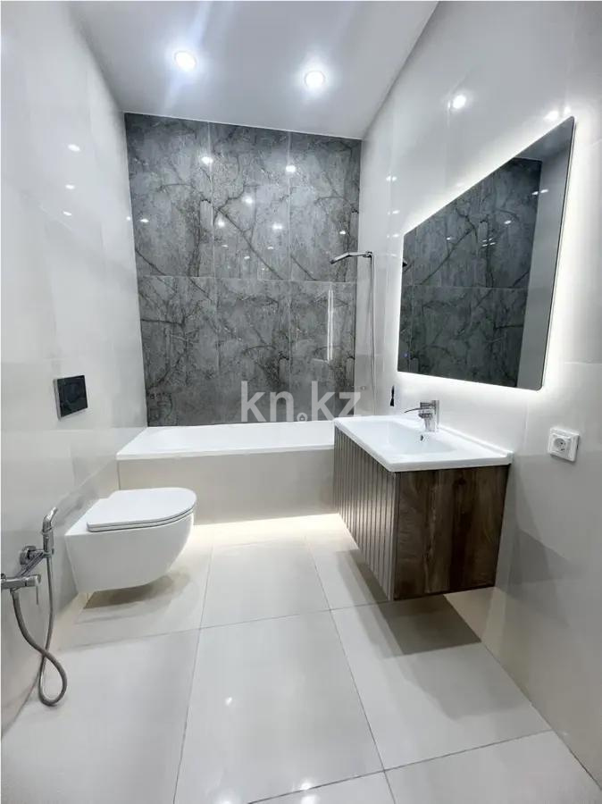 Продажа 2-комнатной квартиры, 63 м², ул. Е-429, дом  14 в Астане - фото 4