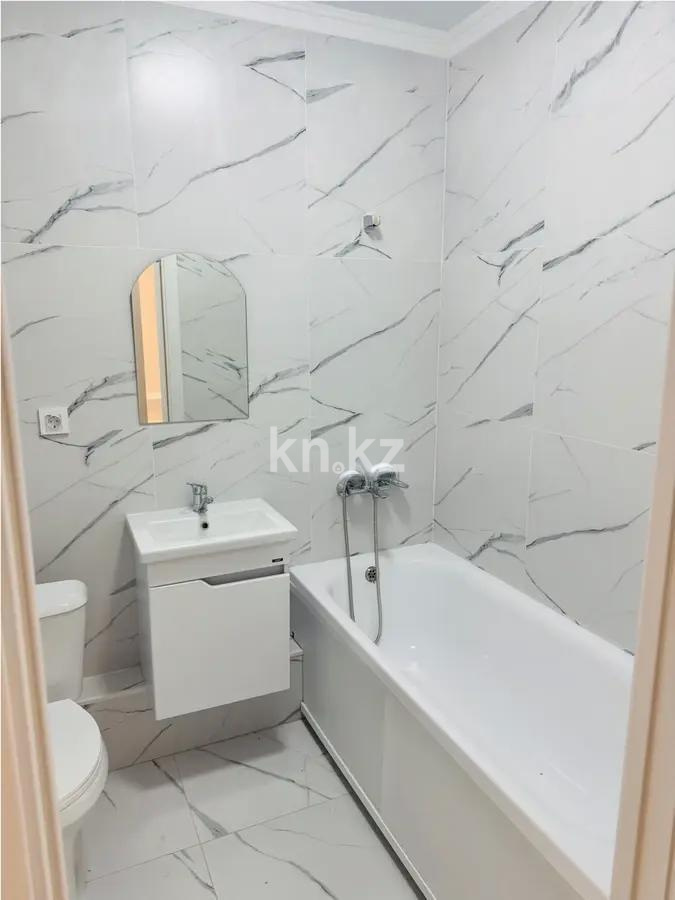 Продажа 2-комнатной квартиры, 48 м², ул. Толе би, дом  24 в Астане - фото 3