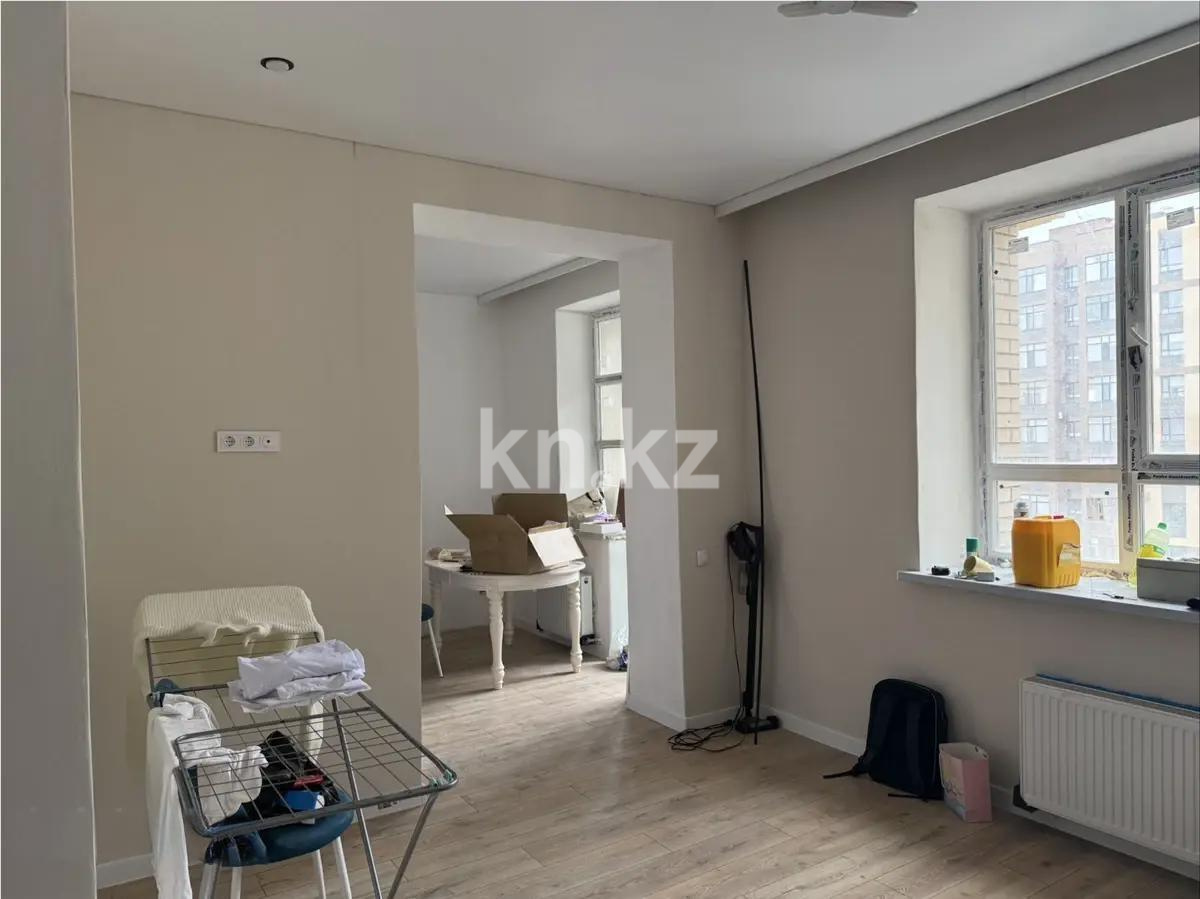 Продажа 1-комнатной квартиры, 36 м², ул. Толе би, дом  12/1 в Астане - фото 2