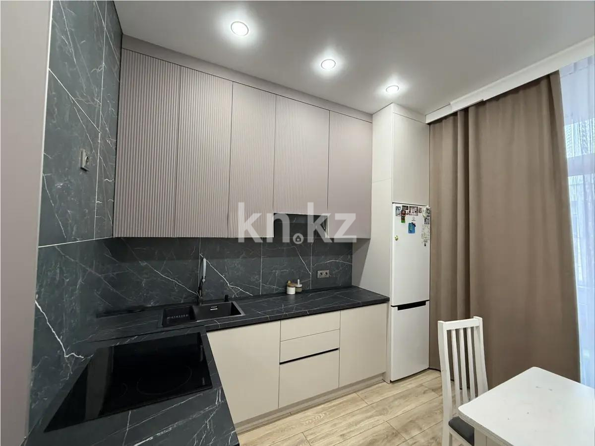 Продажа 2-комнатной квартиры, 59 м², ул. Толе би, дом  14 в Астане - фото 2