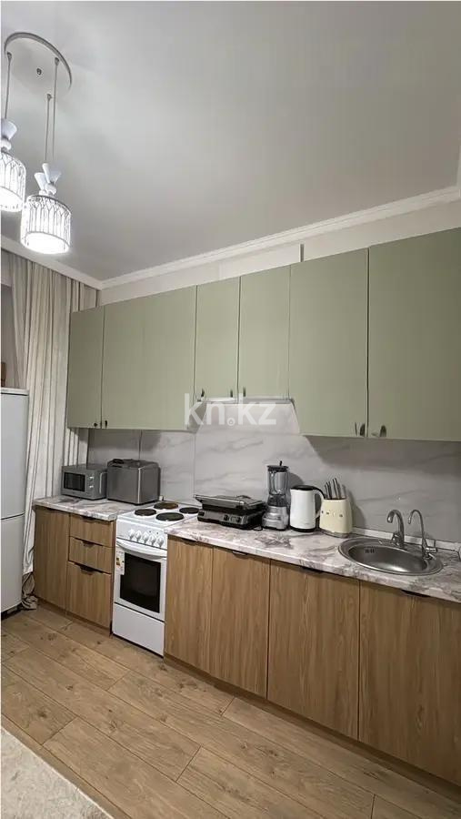 Продажа 1-комнатной квартиры, 39 м², ул. Омарова, дом  21/1 в Астане - фото 2
