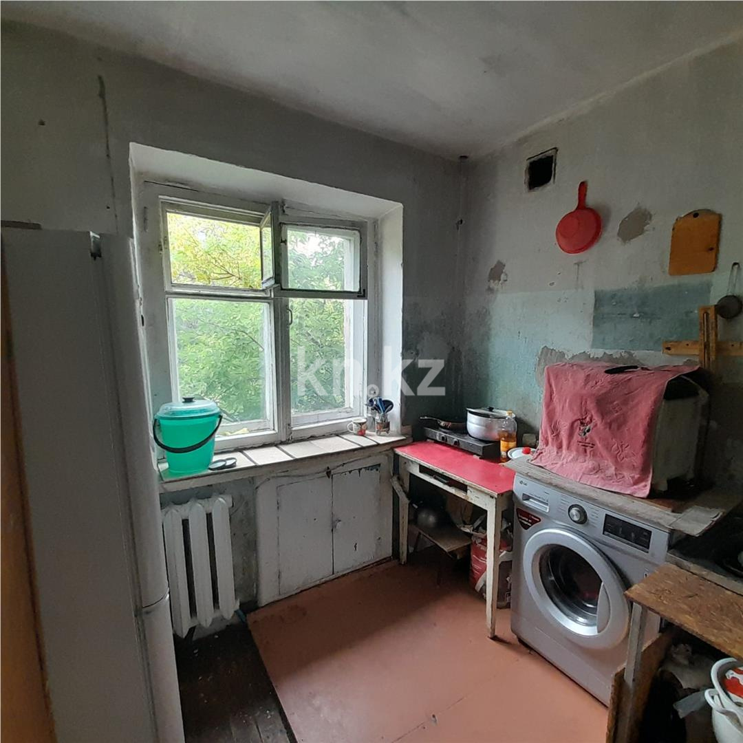 Продажа 4-комнатной квартиры, 60 м², мкр-н 21, дом  29 в Караганде - фото 11