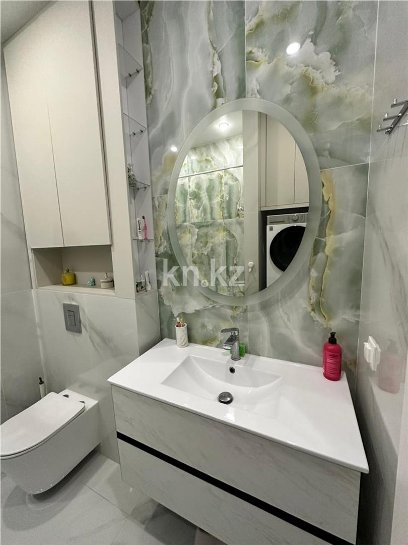 Продажа 4-комнатной квартиры, 110 м², ул. Казыбек би в Астане - фото 14