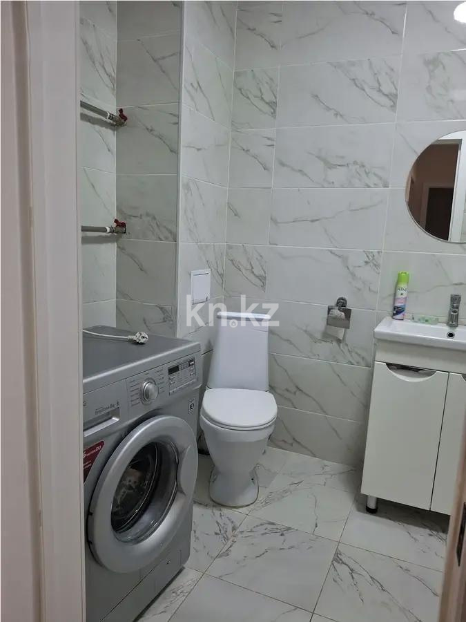 Продажа 1-комнатной квартиры, 48 м², ул. Омарова, дом  3/1 в Астане - фото 4