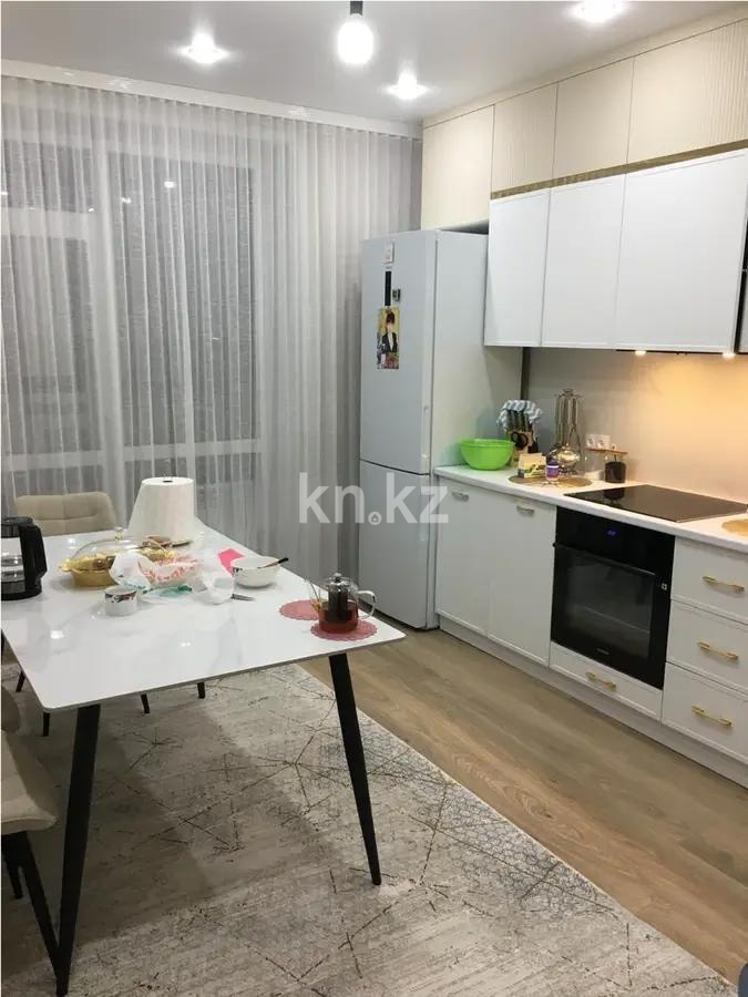 Продажа 2-комнатной квартиры, 61 м², мкр-н Голубые Пруды, дом  12/1 в Караганде - фото 2