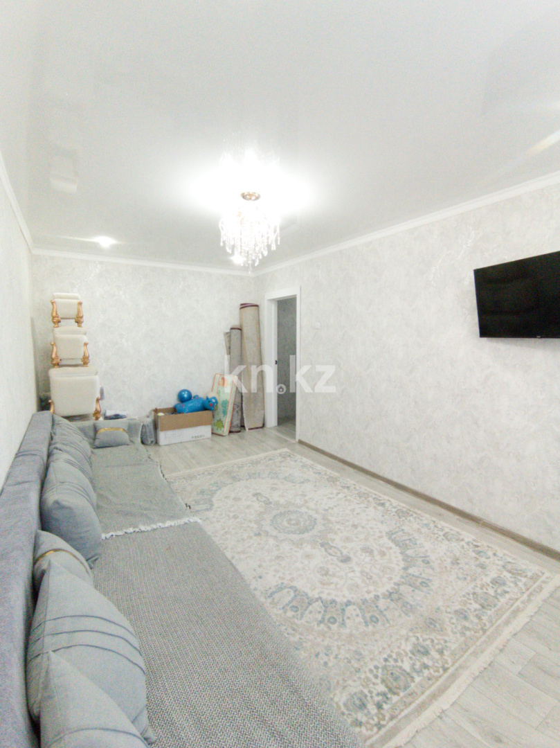 Продажа 2-комнатной квартиры, 52 м², пр. Республики, дом  18/2 в Караганде - фото 2