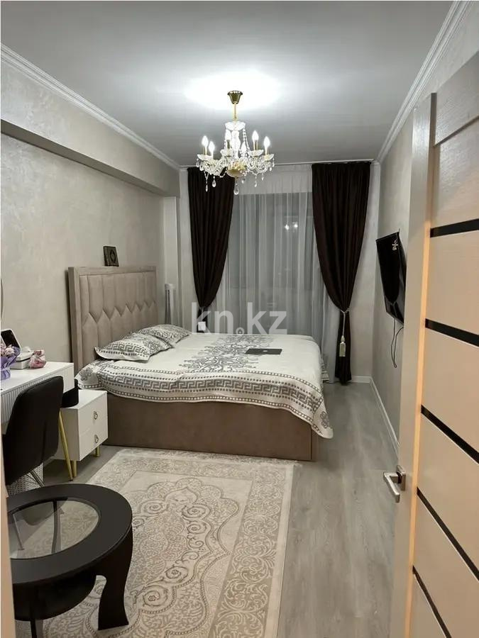 Продажа 2-комнатной квартиры, 52 м², мкр-н 8, дом  41/6 в Алматы - фото 2