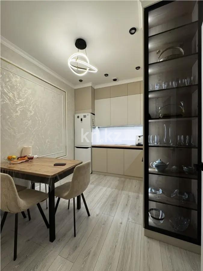 Продажа 2-комнатной квартиры, 52 м², пр. Республики, дом  49 в Караганде - фото 3