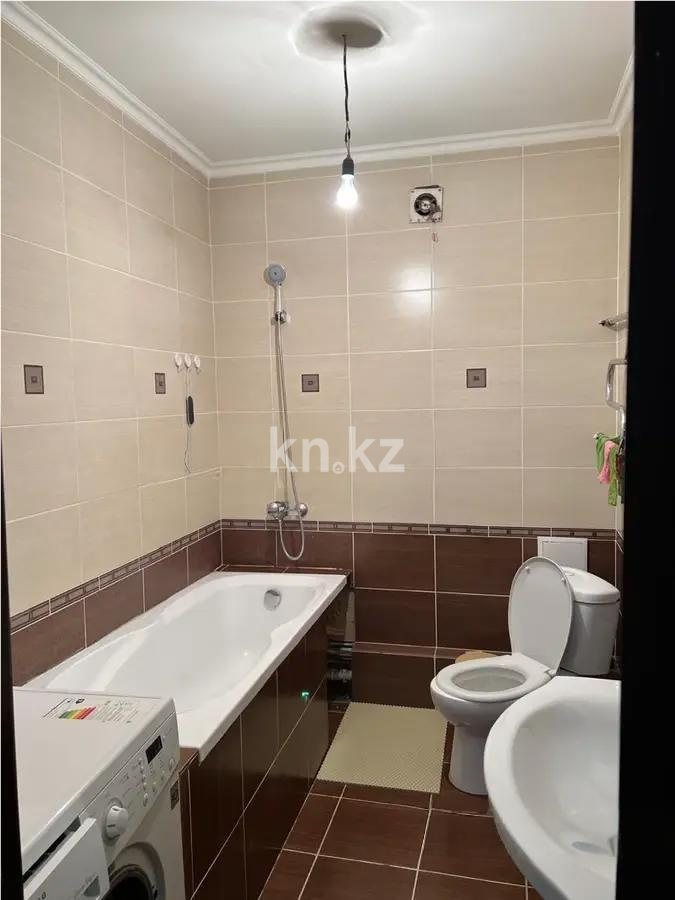 Продажа 1-комнатной квартиры, 59 м², пр. Кошкарбаева, дом  40 в Астане - фото 3