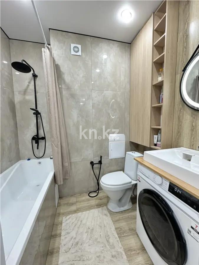 Продажа 2-комнатной квартиры, 52 м², ул. Е-15, дом  9 в Астане - фото 4