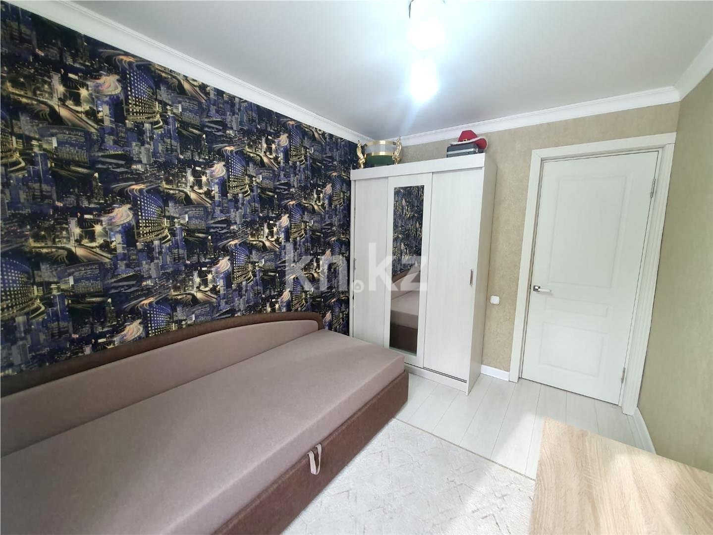 Продажа 3-комнатной квартиры, 57 м², ул. Аманжолова в Караганде - фото 5