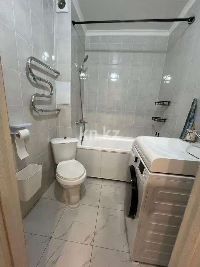 Продажа 1-комнатной квартиры, 32 м², ул. Мустафа Шокай, дом  107 в Астане - фото 2
