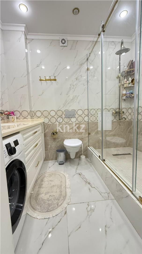 Продажа 1-комнатной квартиры, 49 м², ул. Сыганак в Астане - фото 5