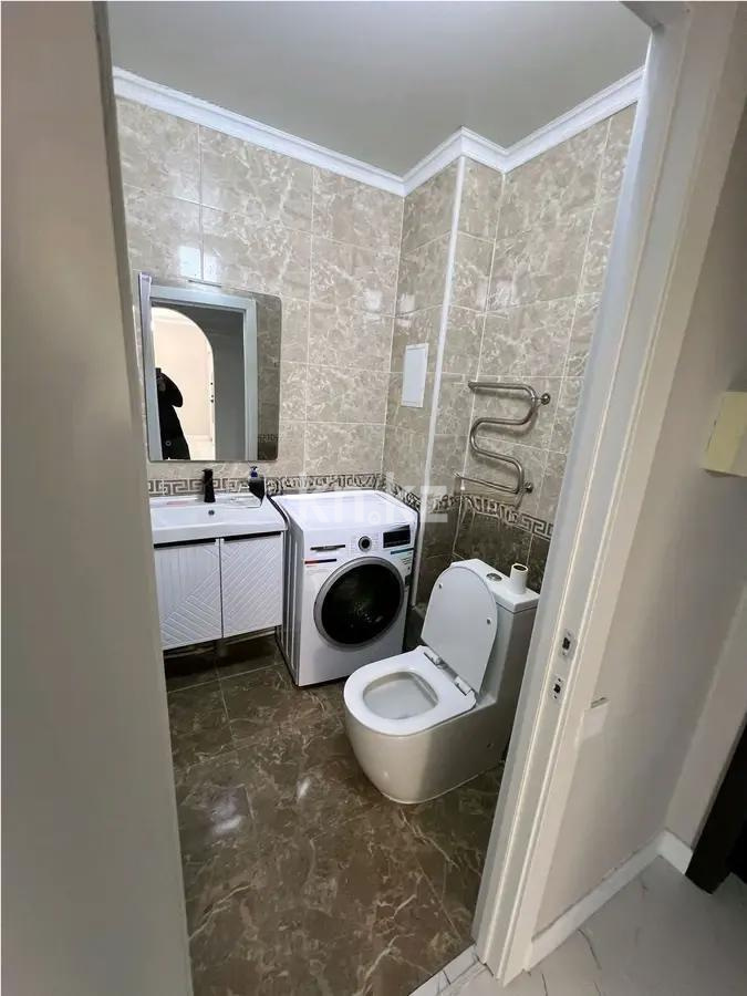 Продажа 2-комнатной квартиры, 65 м², ул. Сыганак, дом  54 в Астане - фото 4