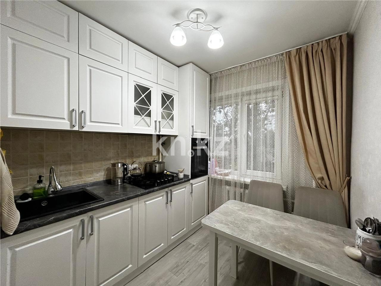 Продажа 3-комнатной квартиры, 63 м², ул. Муканова в Караганде - фото 7