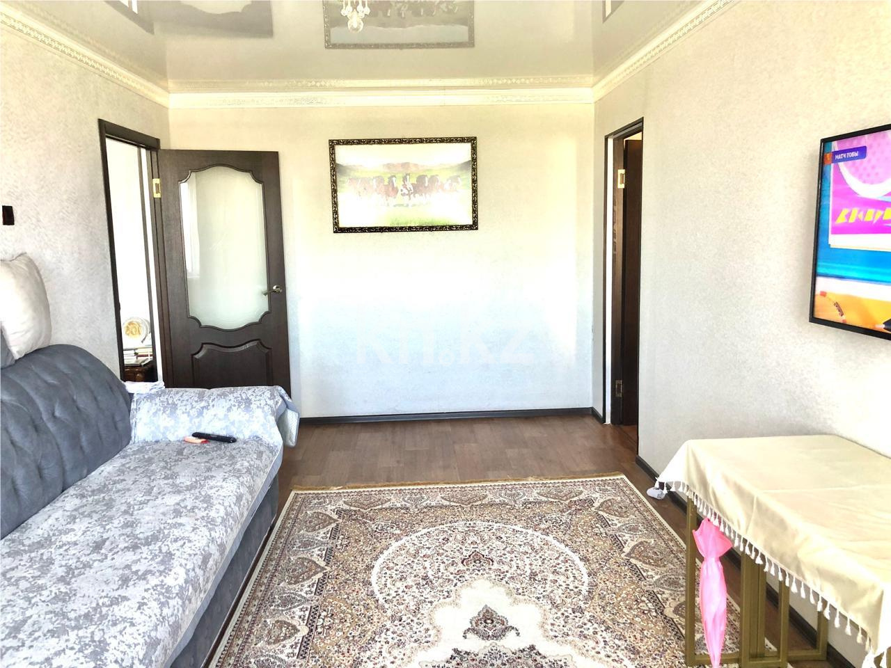 Продажа 2-комнатной квартиры, 52 м², мкр-н 15 в Караганде - фото 2