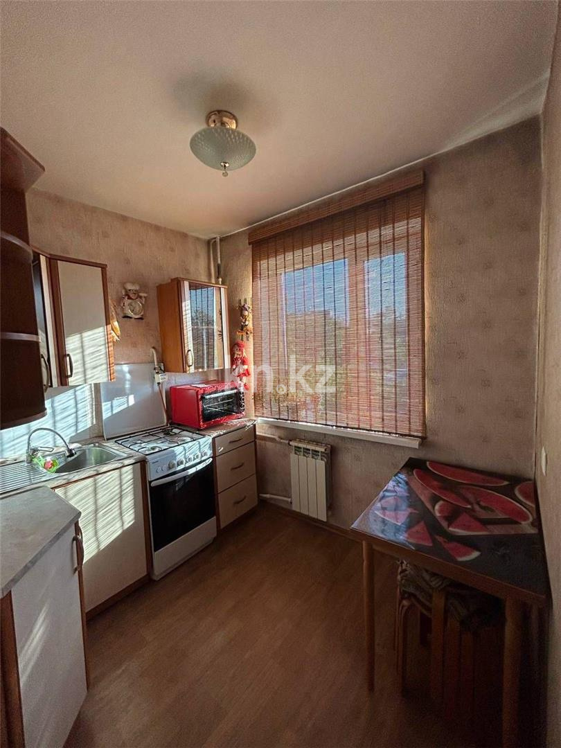 Продажа 3-комнатной квартиры, 58 м², ул. Ерубаева в Караганде - фото 11