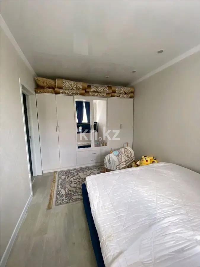 Продажа 2-комнатной квартиры, 54 м², мкр. Гульдер-1, дом  12 в Караганде - фото 3