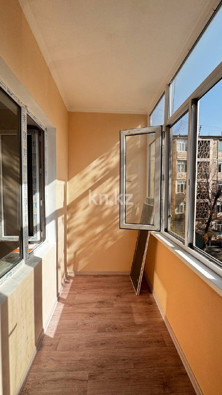 Продажа 2-комнатной квартиры, 52 м², 10 мкр, дом  1 в Таразе - фото 9