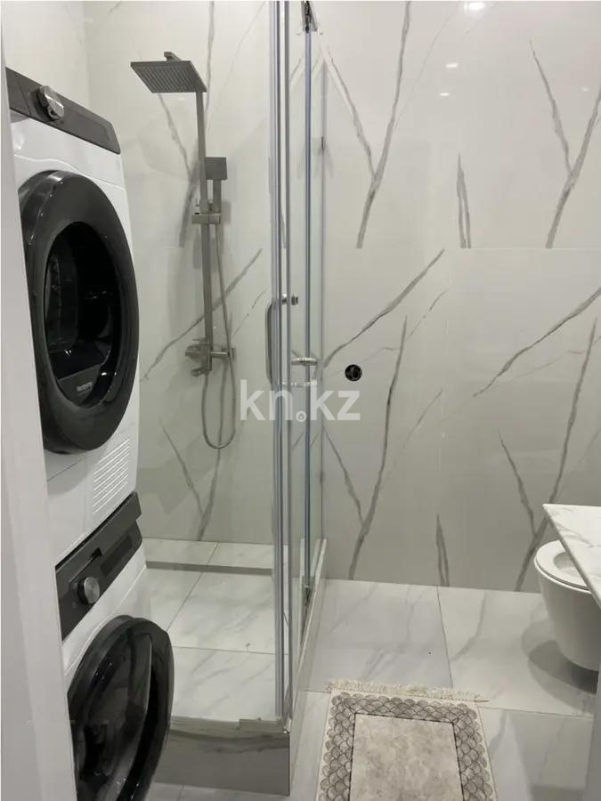 Продажа 4-комнатной квартиры, 118 м², ул. Толе би, дом  63 в Астане - фото 4