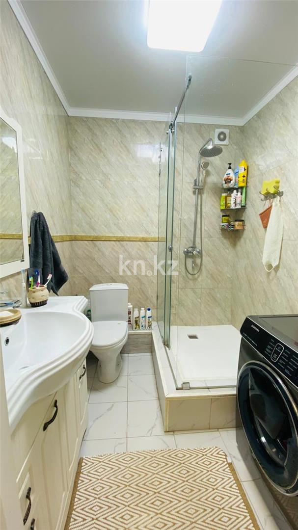 Продажа 4-комнатной квартиры, 110 м², ул. Муканова в Караганде - фото 25