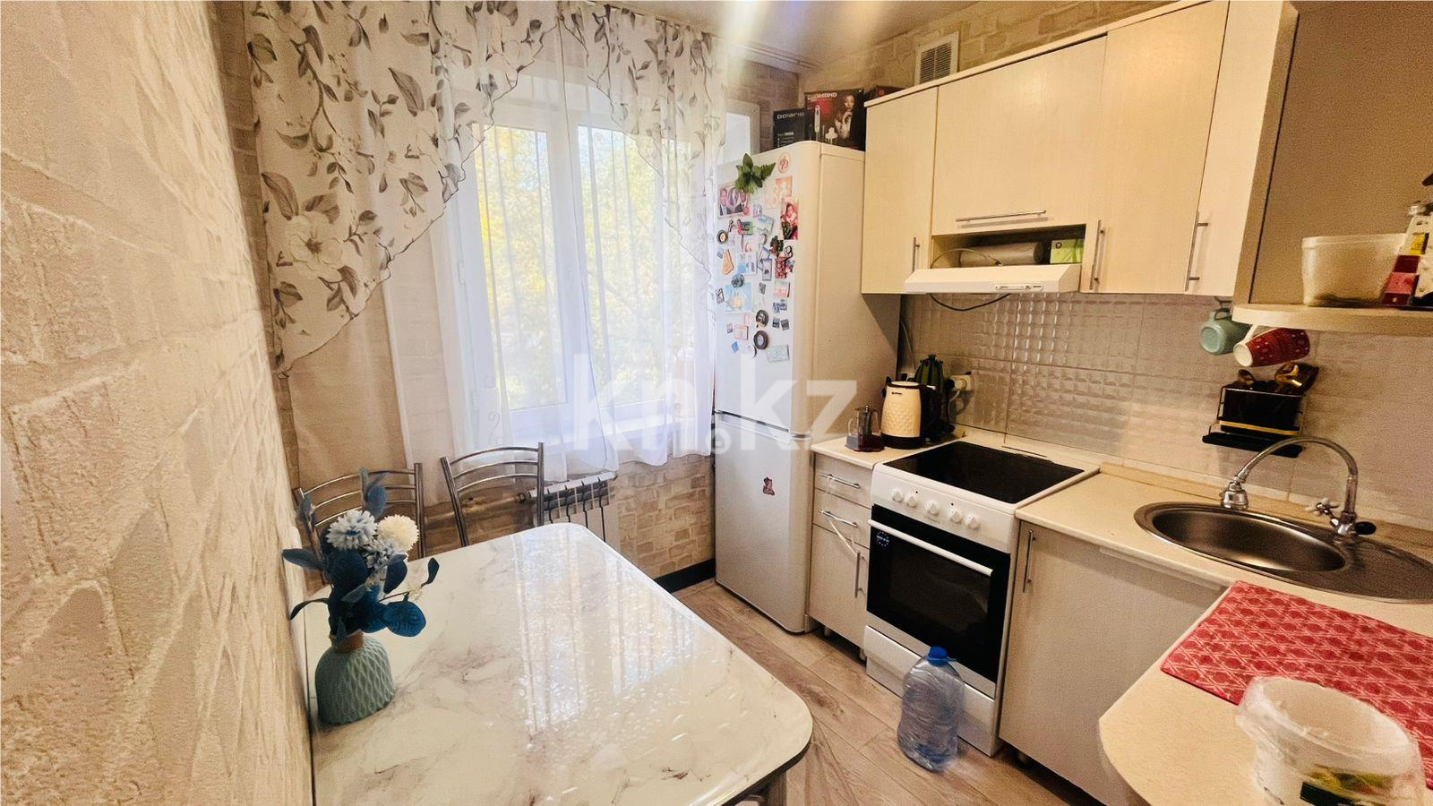 Продажа 4-комнатной квартиры, 62 м², мкр-н 16 в Караганде - фото 19