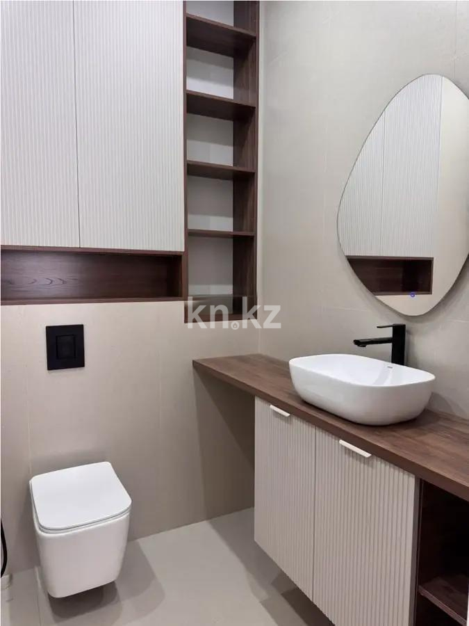 Продажа 2-комнатной квартиры, 56 м², ул. Сыганак, дом  28 в Астане - фото 2