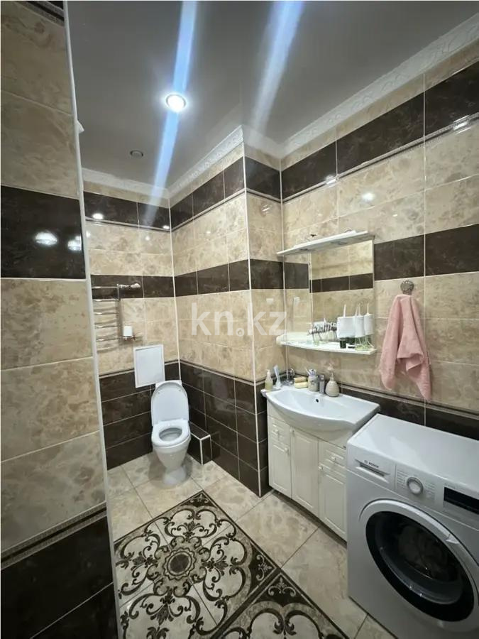 Продажа 2-комнатной квартиры, 63 м², пр. Кошкарбаева, дом  32/2 в Астане - фото 4