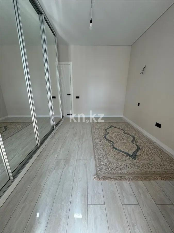 Продажа 2-комнатной квартиры, 48 м², ул. Толе би, дом  63 в Астане - фото 2