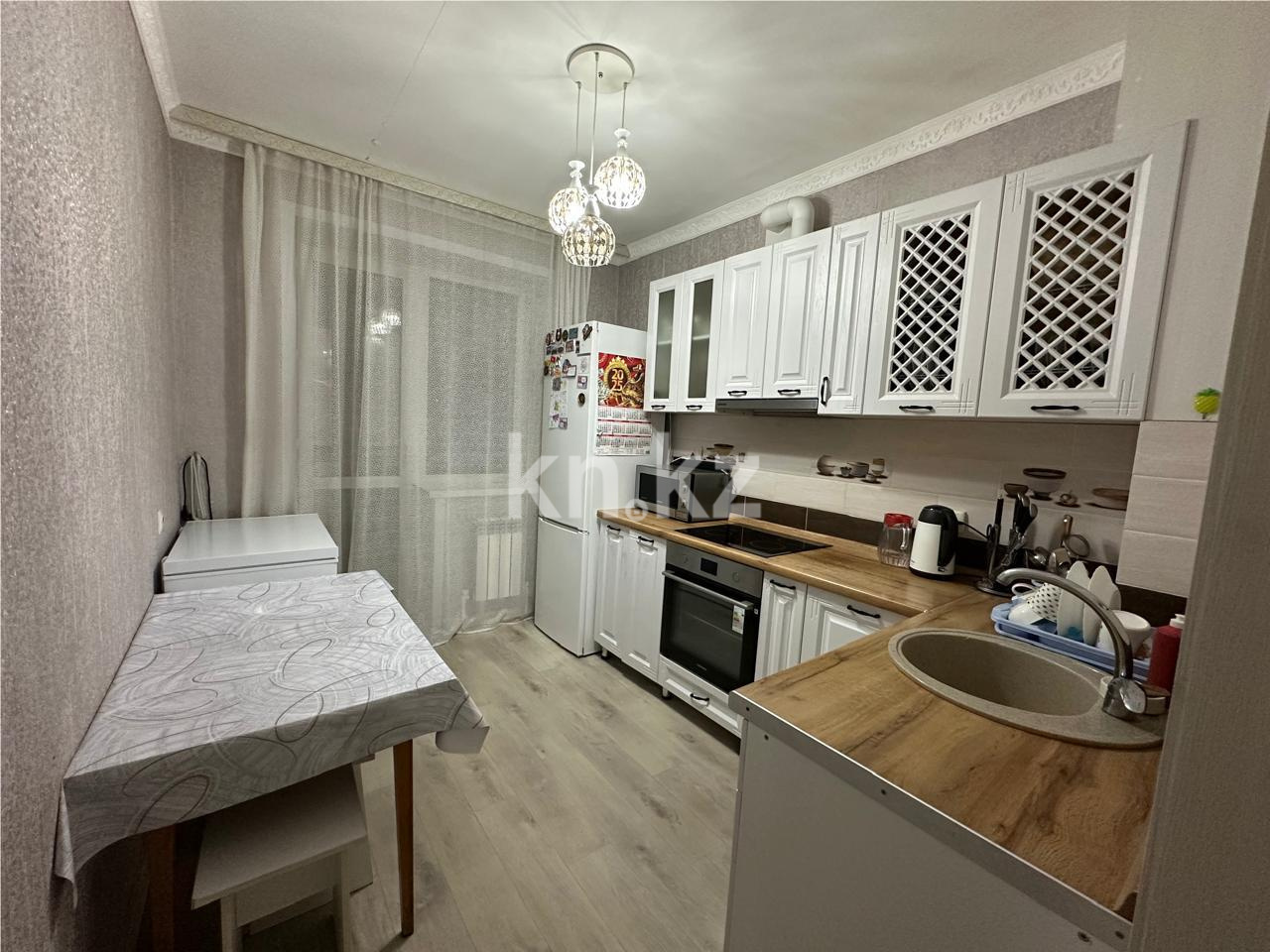 Продажа 2-комнатной квартиры, 54 м², ул. Сатыбалдина в Караганде - фото 5