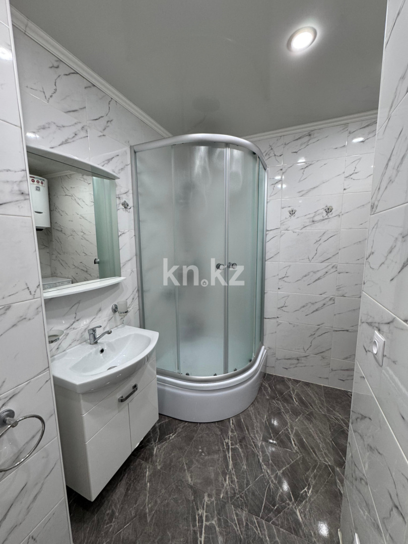 Продажа 2-комнатной квартиры, 55.4 м², ул. Муканова в Караганде - фото 15