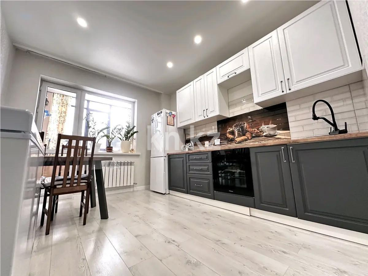 Продажа 2-комнатной квартиры, 58 м², ул. Толе би, дом  40 в Астане - фото 2