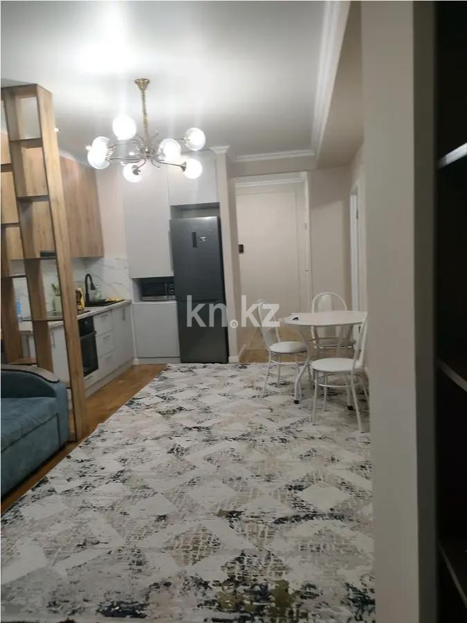 Продажа 2-комнатной квартиры, 50 м², ул. Толе би, дом  189/3 в Алматы - фото 2