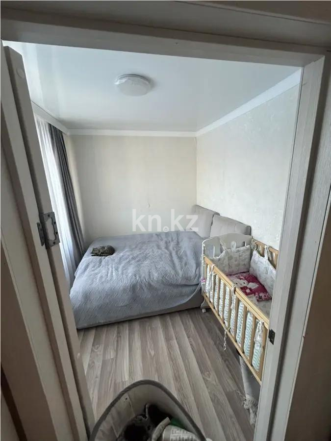 Продажа 3-комнатной квартиры, 48 м², 18 мкр., дом  22 в Караганде - фото 3